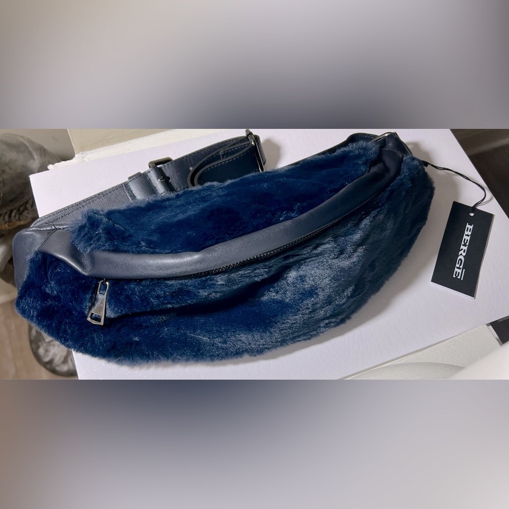 Faux fur adjustable waist pouch.